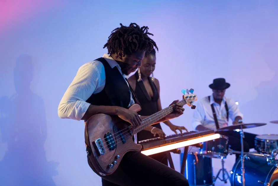 Zee Fola performing live on stage